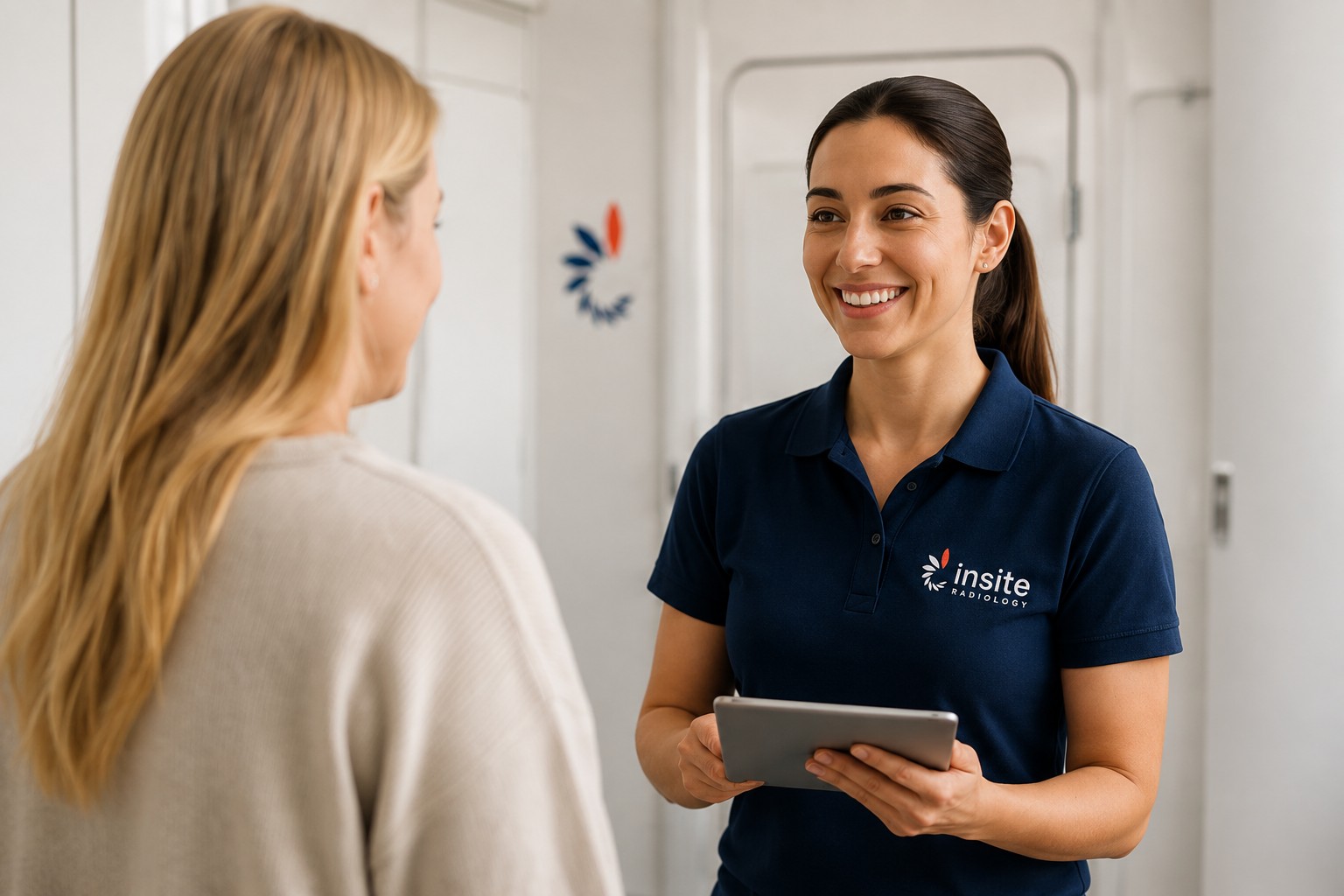 Insite Radiology radiographer explaining an on-site imaging appointment
